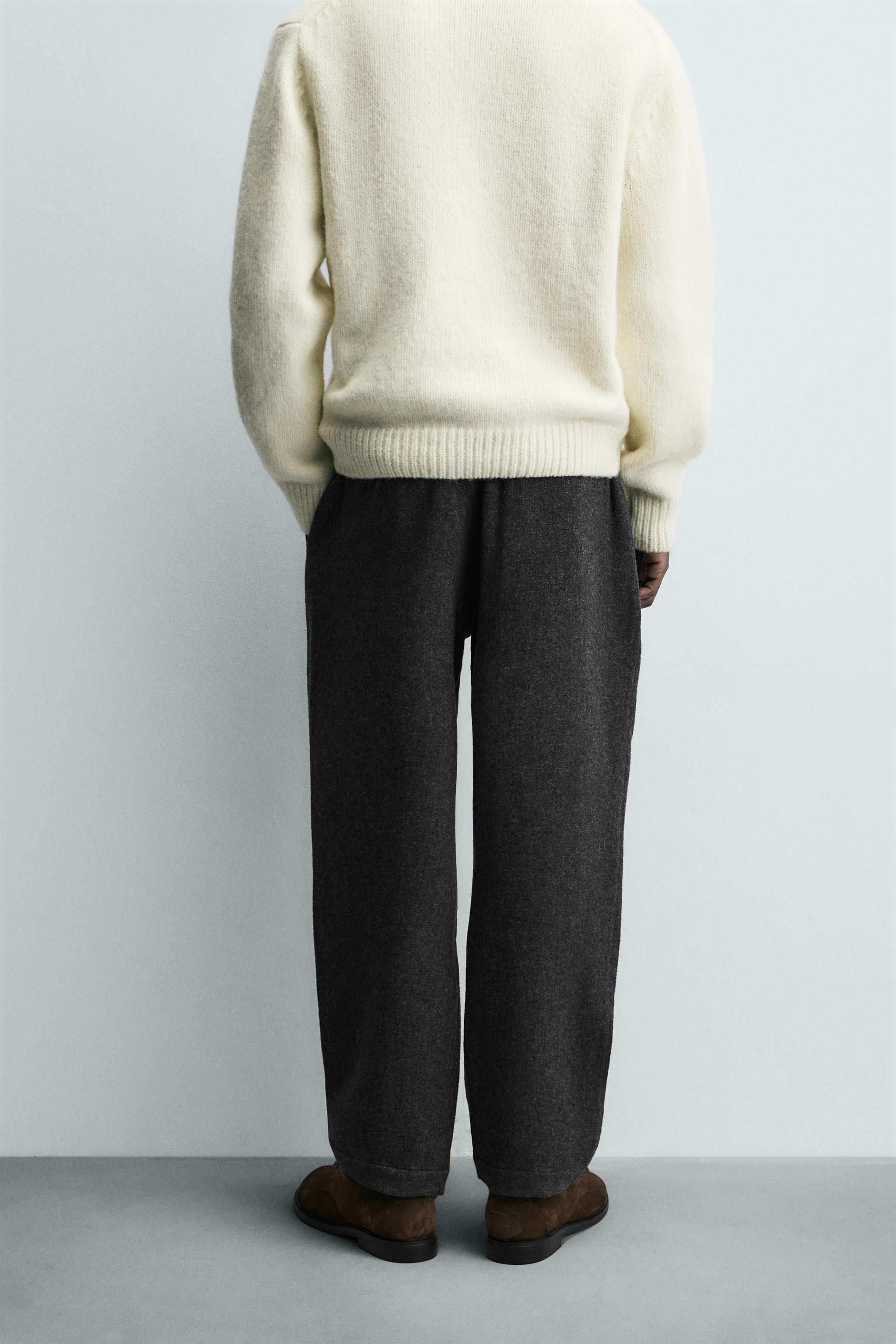 PLEATED WOOL PANTS
